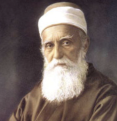Bahá’u’lláh, en mann med langt, hvitt sjegg og bart.